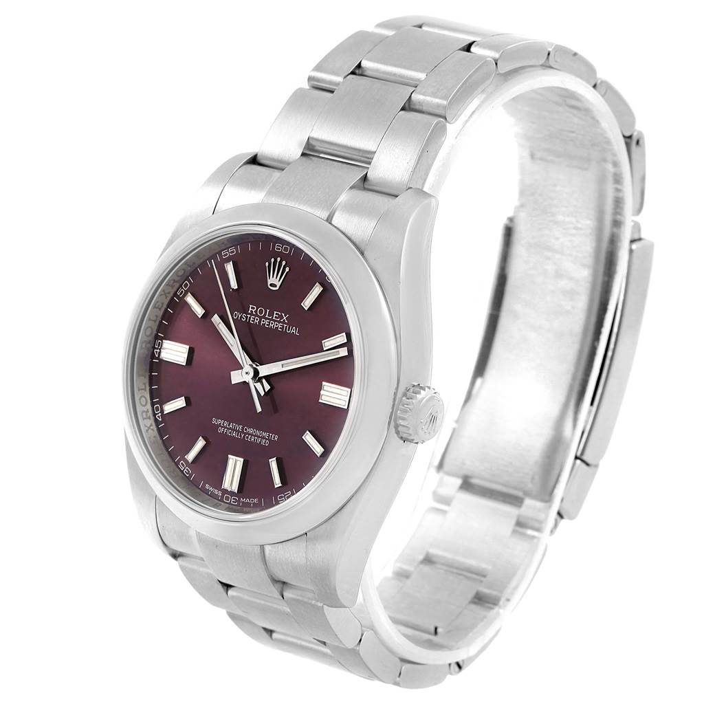 The photo shows a three-quarter angle view of the Rolex Oyster Perpetual 116000 Stainless Steel Burgundy Dial 116000 Stainless Steel Burgundy Dial watch, highlighting its face, bezel, crown, and bracelet.