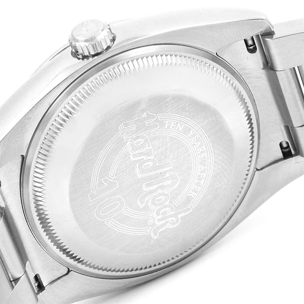 This image shows the case back and crown of a Rolex Oyster Perpetual 114200 Stainless Steel White Dial 114200 Stainless Steel White Dial watch.