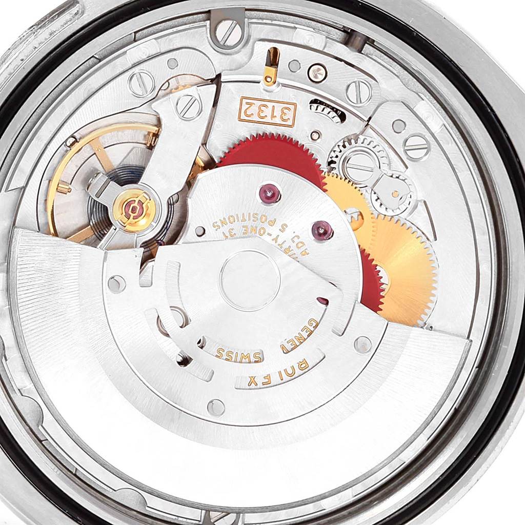 This image shows the inner mechanism of a Rolex Oyster Perpetual 114300 Stainless Steel Burgundy Dial 114300 Stainless Steel Burgundy Dial watch from a back view, revealing its intricate gears and components.