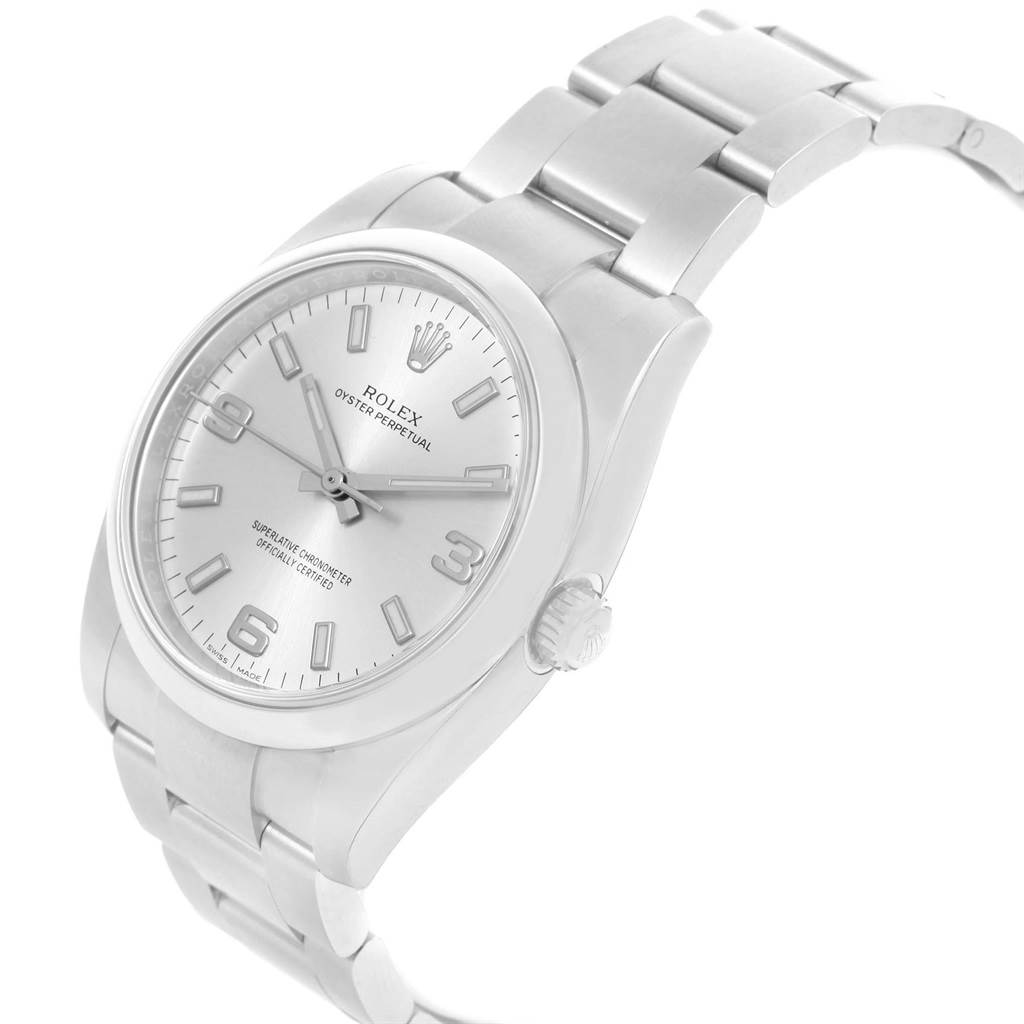 This is a side view of a Rolex Oyster Perpetual 114200 Stainless Steel Silver Dial 114200 Stainless Steel Silver Dial watch showing the face, bracelet, and crown.
