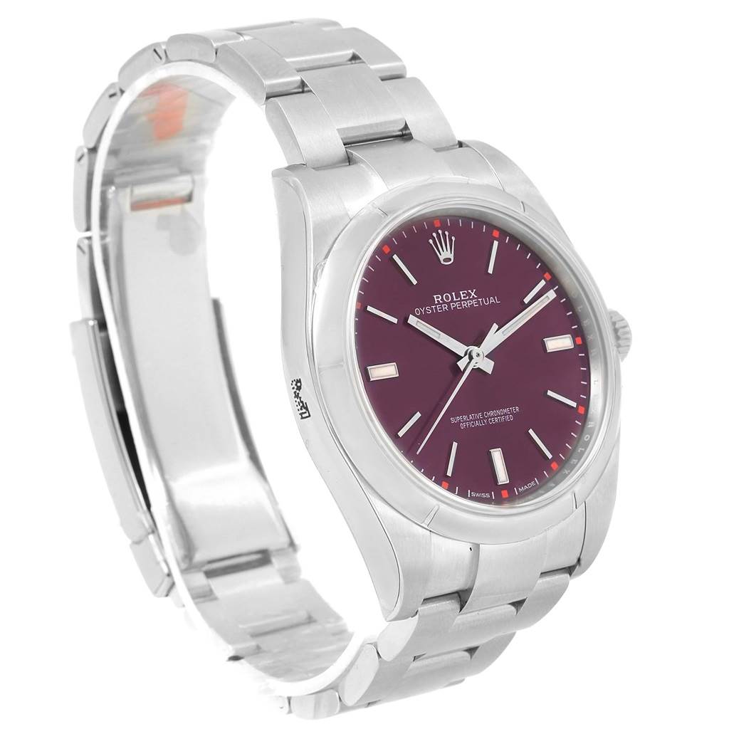 The Rolex Oyster Perpetual 114300 Stainless Steel Burgundy Dial 114300 Stainless Steel Burgundy Dial watch is shown at a slight angle, displaying the face, bracelet, and part of the clasp.