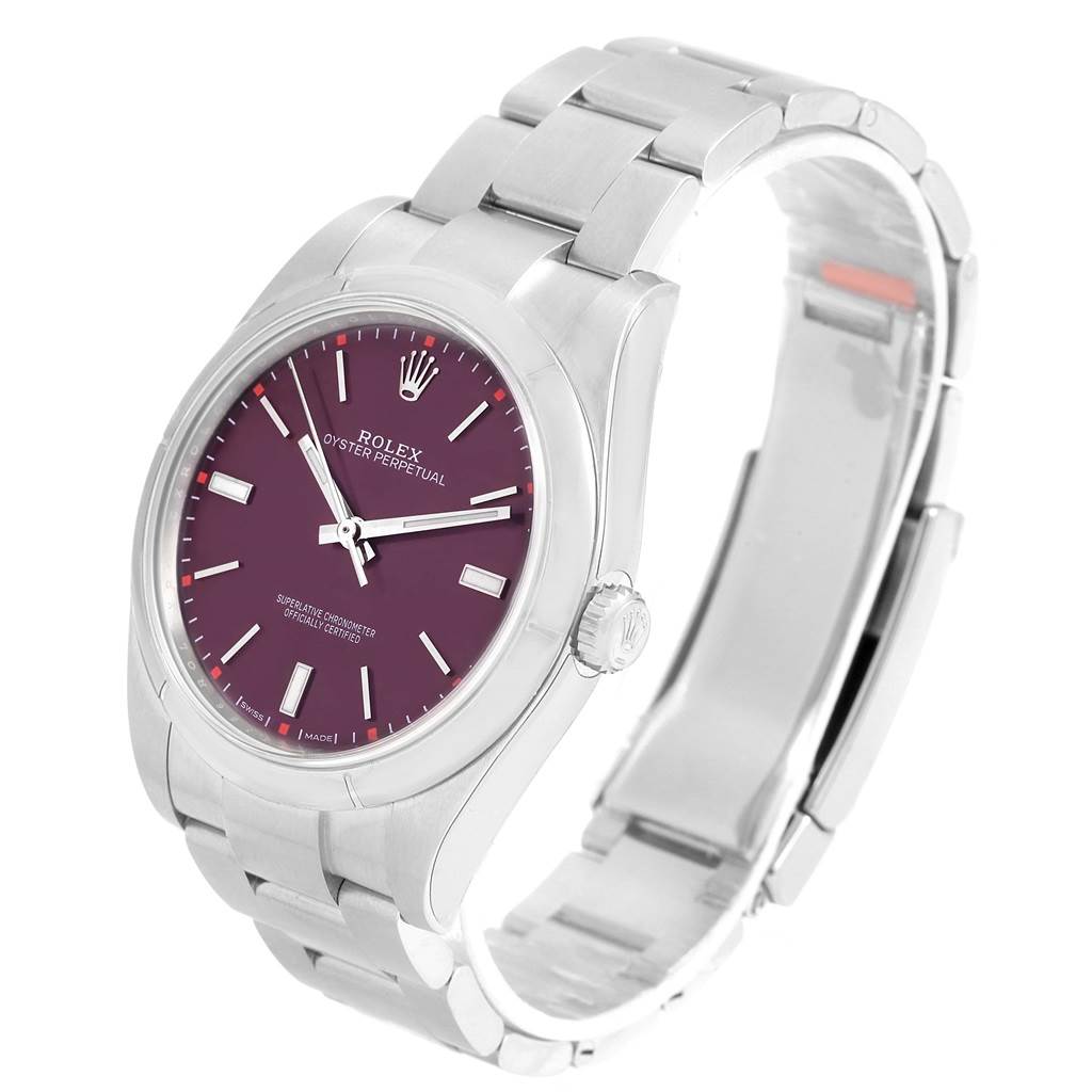 The image shows a Rolex Oyster Perpetual 114300 Stainless Steel Burgundy Dial 114300 Stainless Steel Burgundy Dial watch at a three-quarter angle with a visible face, crown, and bracelet.