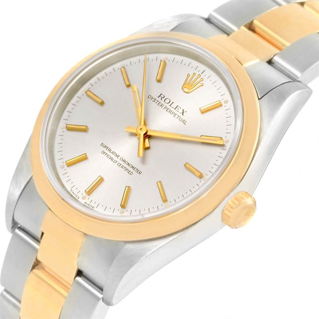 The image shows a close-up angled view of a Rolex Oyster Perpetual 14203 Steel and Gold (two tone) Silver Dial 14203 Steel and Gold (two tone) Silver Dial watch, highlighting the dial, bezel, and part of the bracelet.