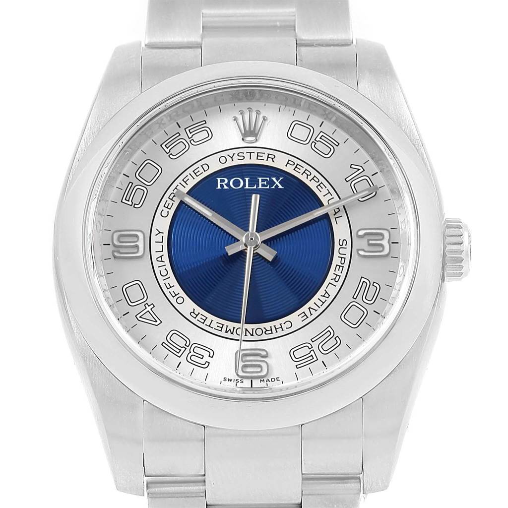 The image shows a front view of a Rolex Oyster Perpetual 116000 Men's Stainless Steel Silver Dial 116000 Men's Stainless Steel Silver Dial watch, highlighting the dial, hands, crown, and stainless steel bracelet.