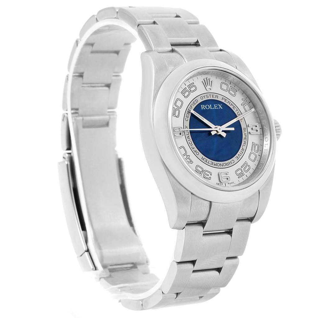 This image shows a side angle view of the Rolex Oyster Perpetual 116000 Men's Stainless Steel Silver Dial 116000 Men's Stainless Steel Silver Dial watch, highlighting its bracelet, case, and dial.