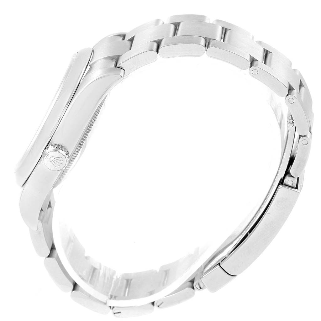 This image shows the side view of a Rolex Oyster Perpetual 116000 Men's Stainless Steel Blue Dial 116000 Men's Stainless Steel Blue Dial watch, focusing on the bracelet and crown.