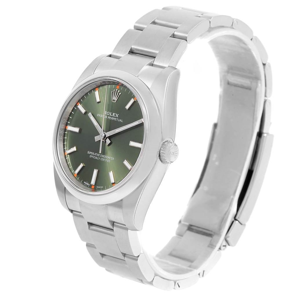 The Rolex Oyster Perpetual 114200 Stainless Steel Green Dial 114200 Stainless Steel Green Dial watch is shown at an angle displaying the face, dial, and stainless steel bracelet.