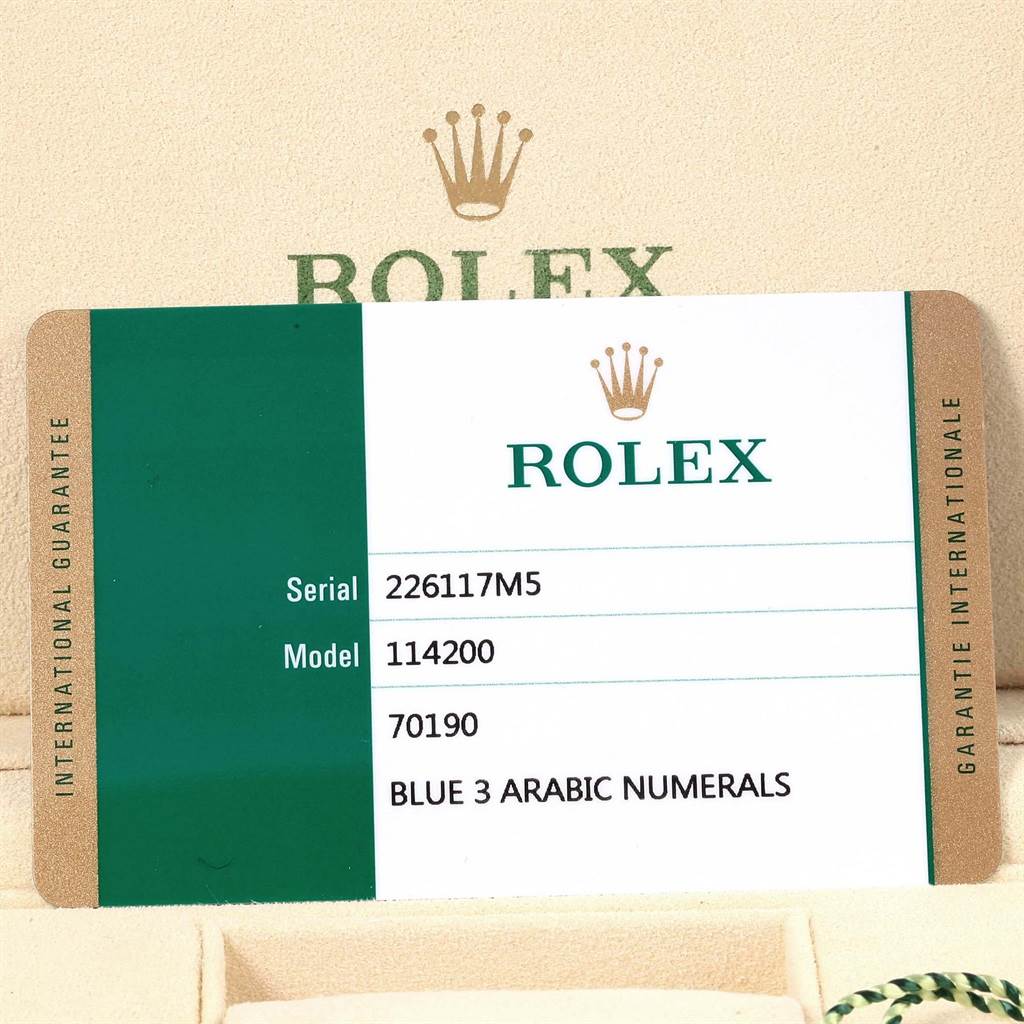 The image shows the guarantee card for a Rolex Oyster Perpetual 114200 Men's Stainless Steel Blue Dial 114200 Men's Stainless Steel Blue Dial model with serial number 226117M5 and model number 114200.