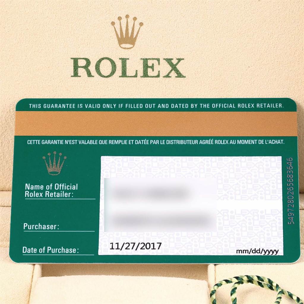 This image shows a Rolex guarantee card for the Oyster Perpetual watch model, with the branding and sale details visible.