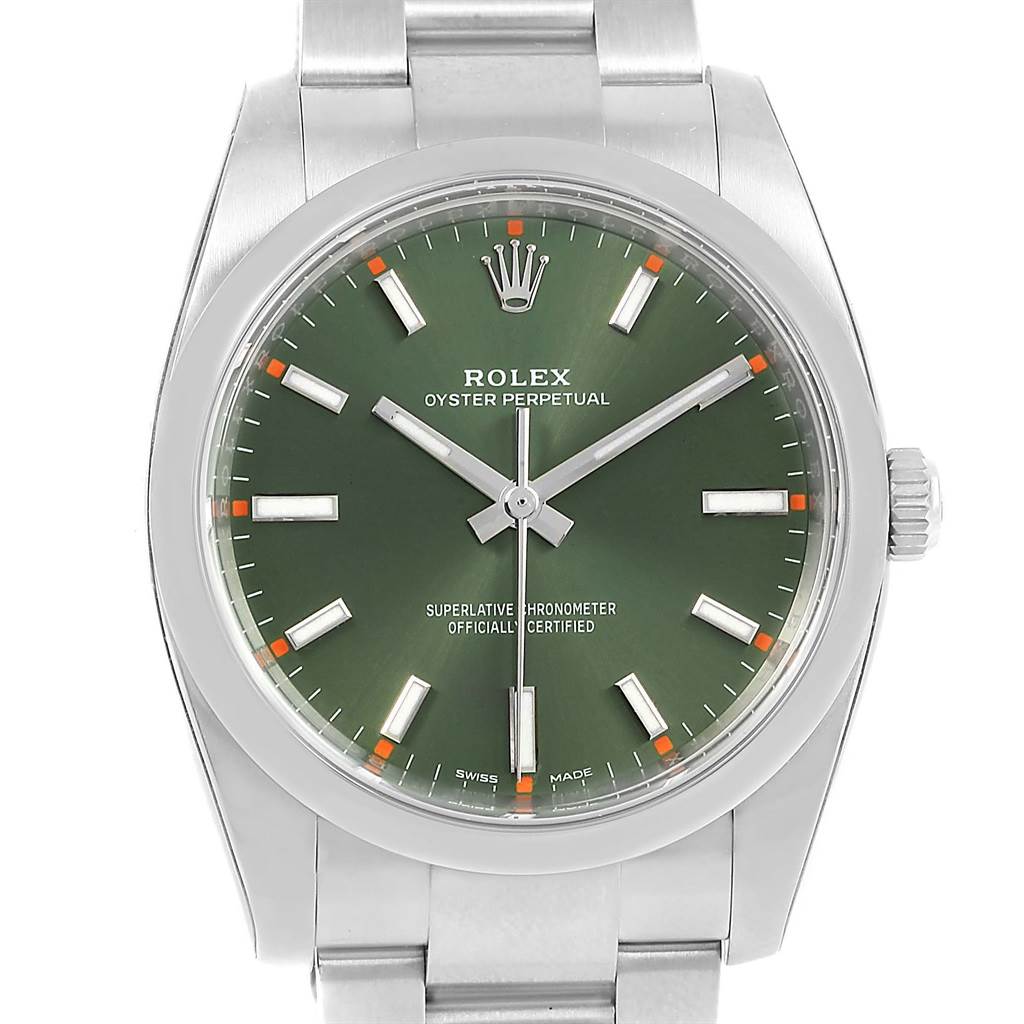 This image shows the Rolex Oyster Perpetual 114200 Green Dial 114200 Green Dial watch from a front angle, highlighting the face, crown, and bracelet.