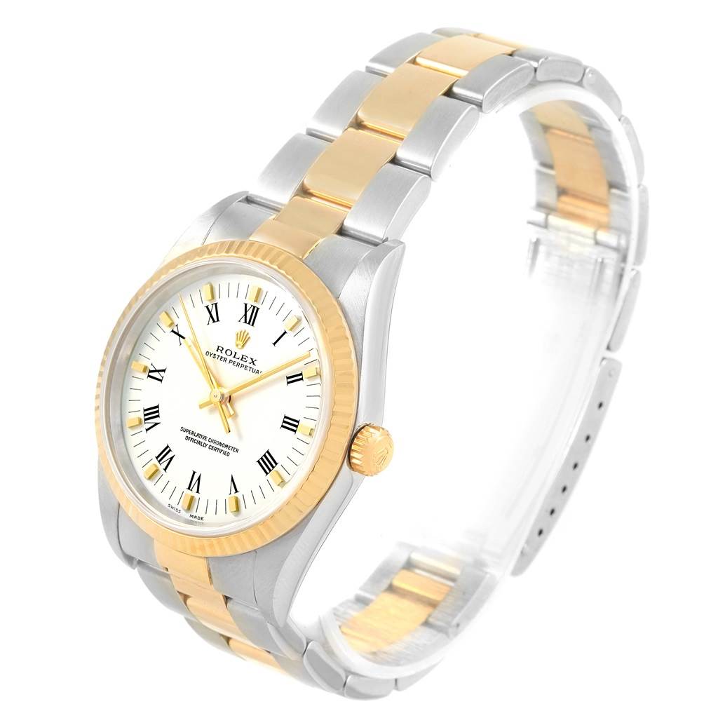 The image shows a Rolex Oyster Perpetual 14233 Men's Steel and Gold (two tone) White Dial 14233 Men's Steel and Gold (two tone) White Dial watch from an angled front view, highlighting the bezel, case, dial, bracelet, and crown.