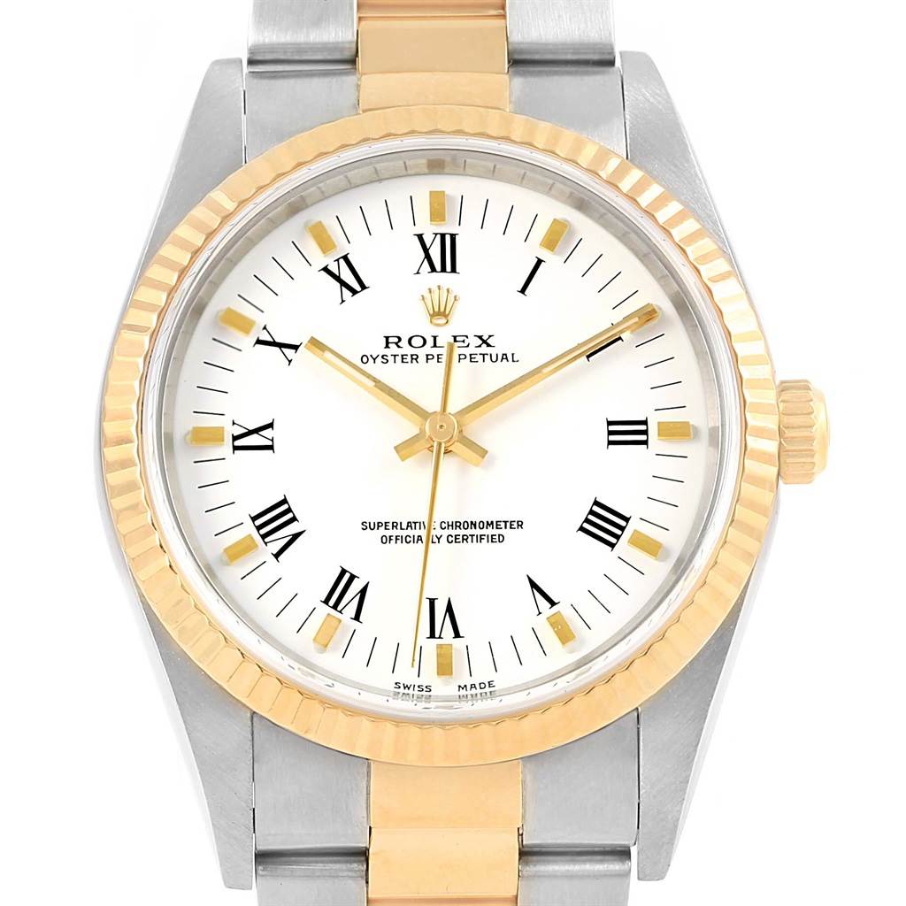 The image shows a front view of the dial and bracelet of a Rolex Oyster Perpetual 14233 Men's Steel and Gold (two tone) White Dial 14233 Men's Steel and Gold (two tone) White Dial watch, featuring a gold bezel and a two-tone band.