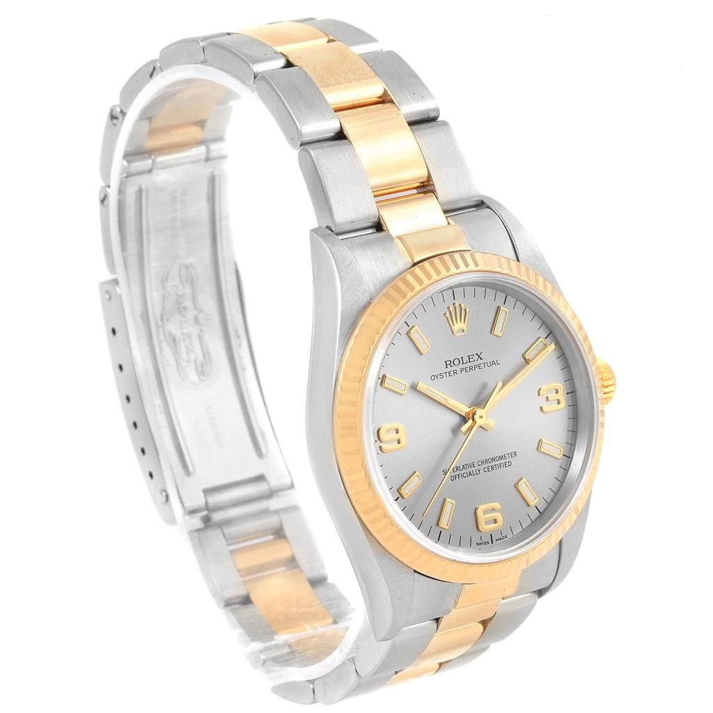 The image shows a Rolex Oyster Perpetual 14233 Men's Steel and Gold (two tone) Grey Dial 14233 Men's Steel and Gold (two tone) Grey Dial watch at an angle highlighting the face, bezel, and two-tone metal bracelet.