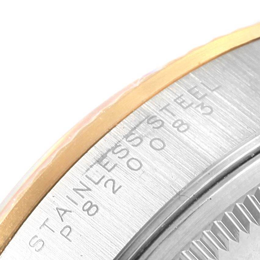 This image shows a close-up of the case back and edge inscriptions of the Rolex Oyster Perpetual 14233 Men's Steel and Gold (two tone) Grey Dial 14233 Men's Steel and Gold (two tone) Grey Dial watch, highlighting the model details.
