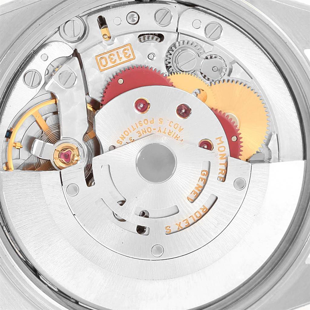 This image shows the inner mechanical movement parts of a Rolex Oyster Perpetual 14233 Men's Steel and Gold (two tone) Grey Dial 14233 Men's Steel and Gold (two tone) Grey Dial watch from a top-down angle.