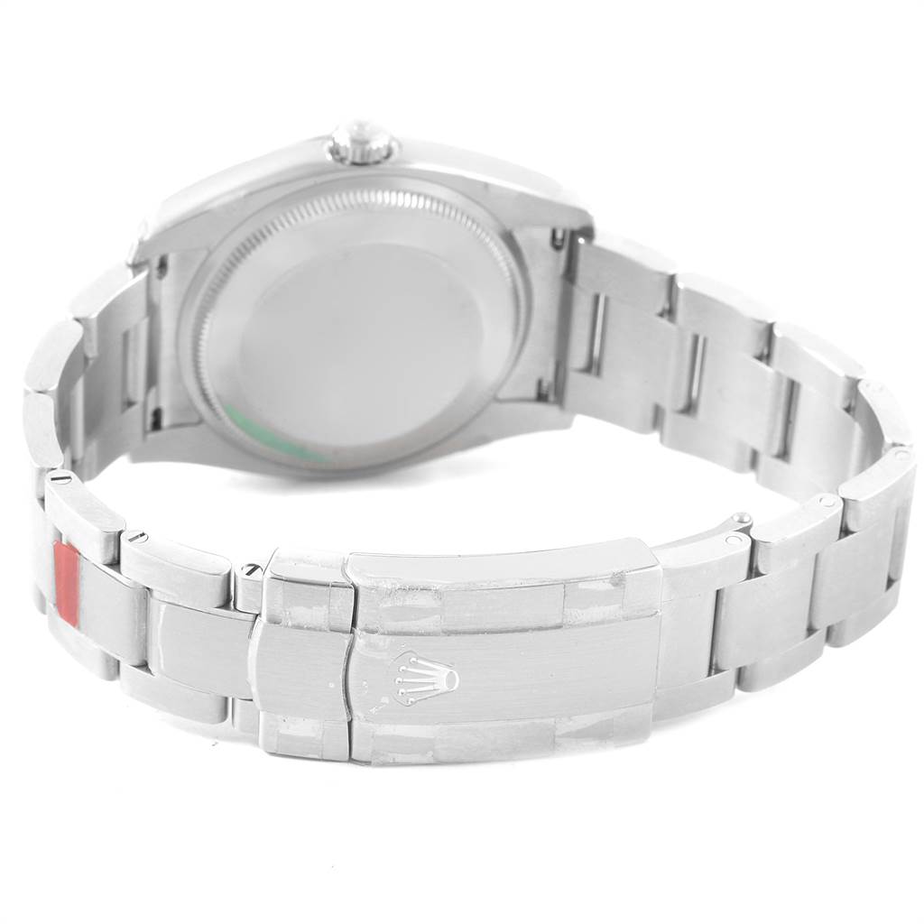 This image shows the back and clasp of a Rolex Oyster Perpetual 114200 Men
s Stainless Steel White Dial 114200 Men
s Stainless Steel White Dial watch, emphasizing its stainless steel bracelet.