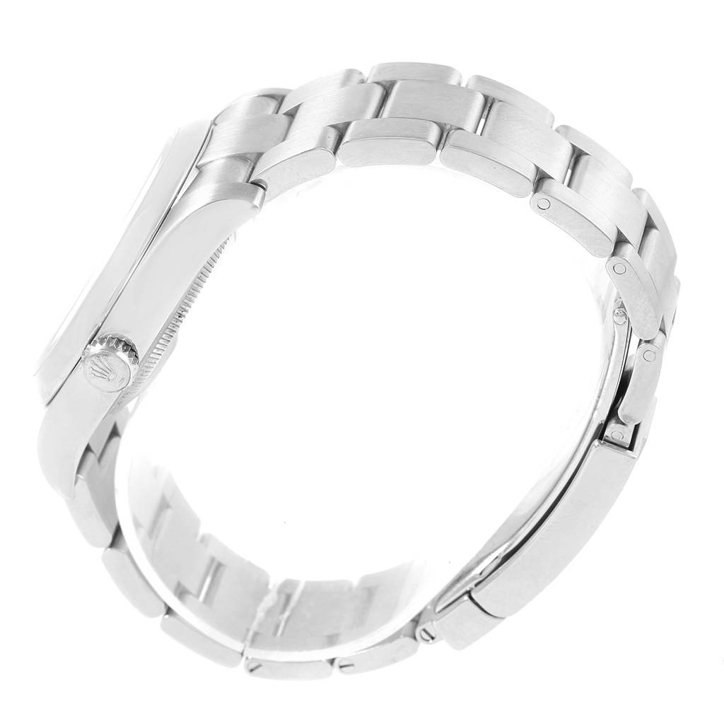 This image shows a side angle of the bracelet and case of a Rolex Oyster Perpetual 116000 Men's Stainless Steel Black Dial 116000 Men's Stainless Steel Black Dial watch.