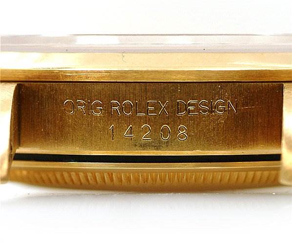 This image shows a close-up of the side engraving on a Rolex Oyster Perpetual 14208 Men
s Yellow Gold Champagne Dial 14208 Men
s Yellow Gold Champagne Dial watch case, featuring the model number 14208.