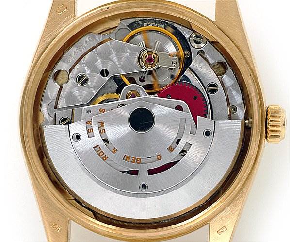 This image shows the inner mechanical parts of the Rolex Oyster Perpetual 14208 Men
s Yellow Gold Champagne Dial 14208 Men
s Yellow Gold Champagne Dial watch from a back view.