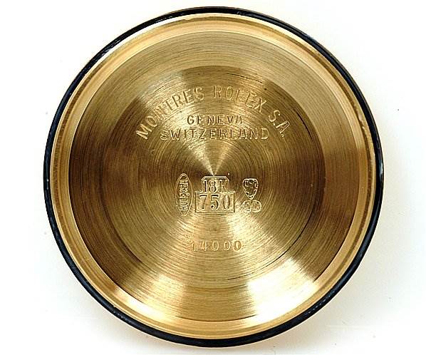 This image shows the inside case back of a Rolex Oyster Perpetual 14208 Men
s Yellow Gold Champagne Dial 14208 Men
s Yellow Gold Champagne Dial watch, featuring engravings of model details and manufacturing marks.