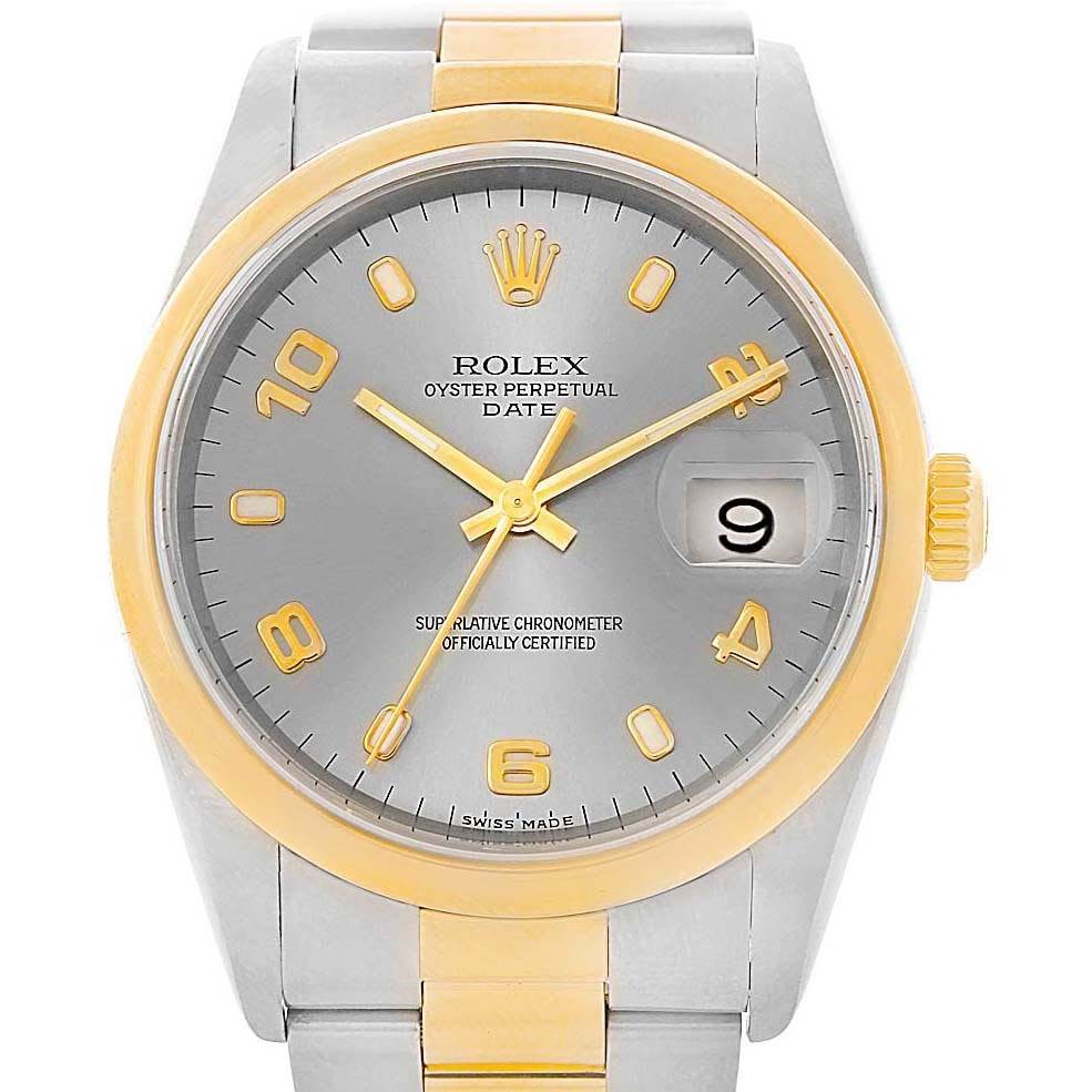 This Rolex Oyster Perpetual 15203 Men's Steel and Gold (two tone) Grey Dial 15203 Men's Steel and Gold (two tone) Grey Dial watch is shown from the front, displaying the dial, hands, bezel, and part of the bracelet.