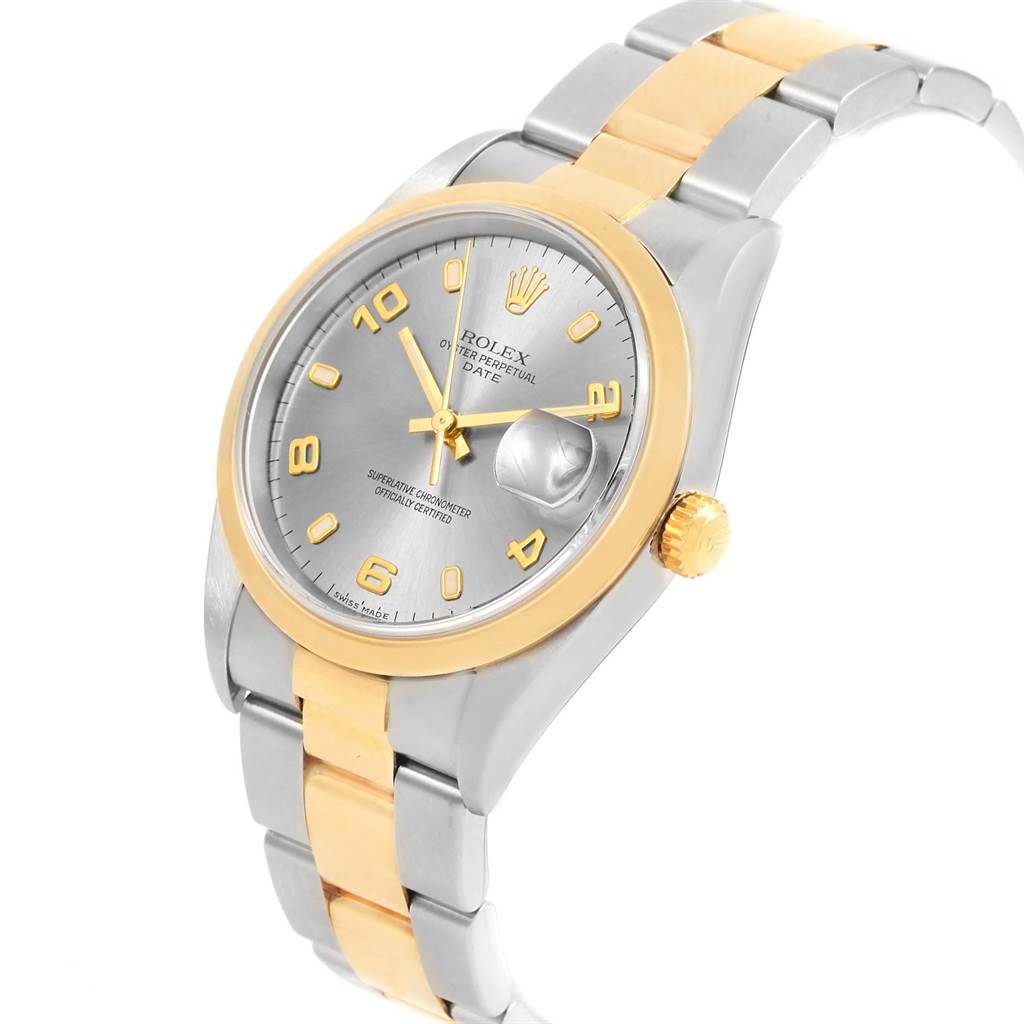 The image shows a side-angle view of a Rolex Oyster Perpetual 15203 Men's Steel and Gold (two tone) Grey Dial 15203 Men's Steel and Gold (two tone) Grey Dial Date watch, highlighting its gold bezel, crown, and two-tone bracelet.