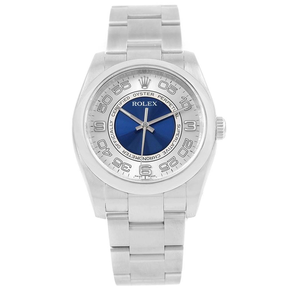 This image shows a front view of a Rolex Oyster Perpetual 116000 Men
s Stainless Steel Silver Dial 116000 Men
s Stainless Steel Silver Dial watch with a blue and silver dial and a metal bracelet.