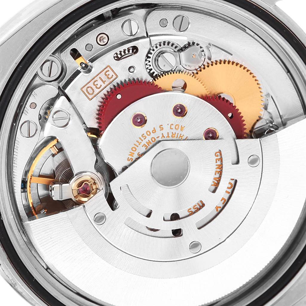 This image shows the internal mechanical movement of a Rolex Oyster Perpetual 116000 Men
s Stainless Steel Silver Dial 116000 Men
s Stainless Steel Silver Dial watch from the back.