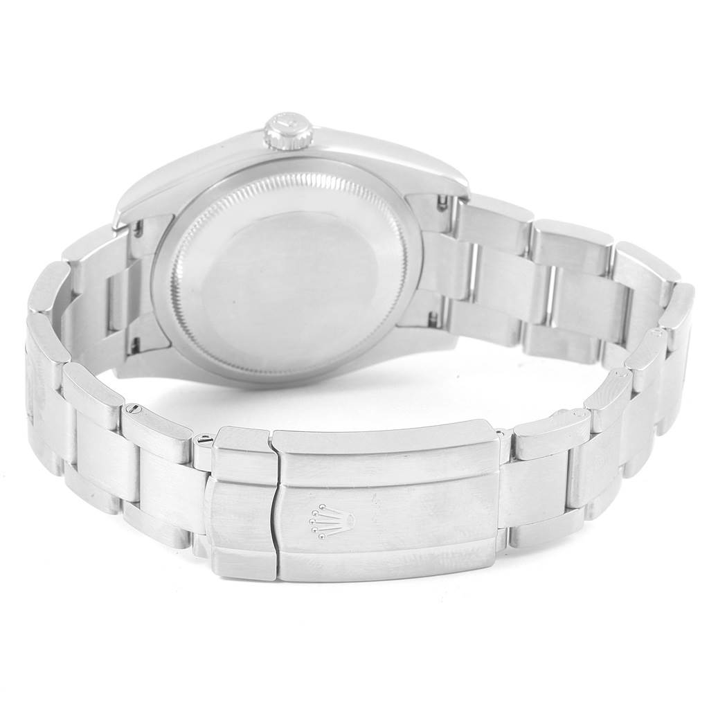 The image shows the back view of a Rolex Oyster Perpetual 116000 Men
s Stainless Steel Silver Dial 116000 Men
s Stainless Steel Silver Dial watch, highlighting the bracelet, case back, and clasp.