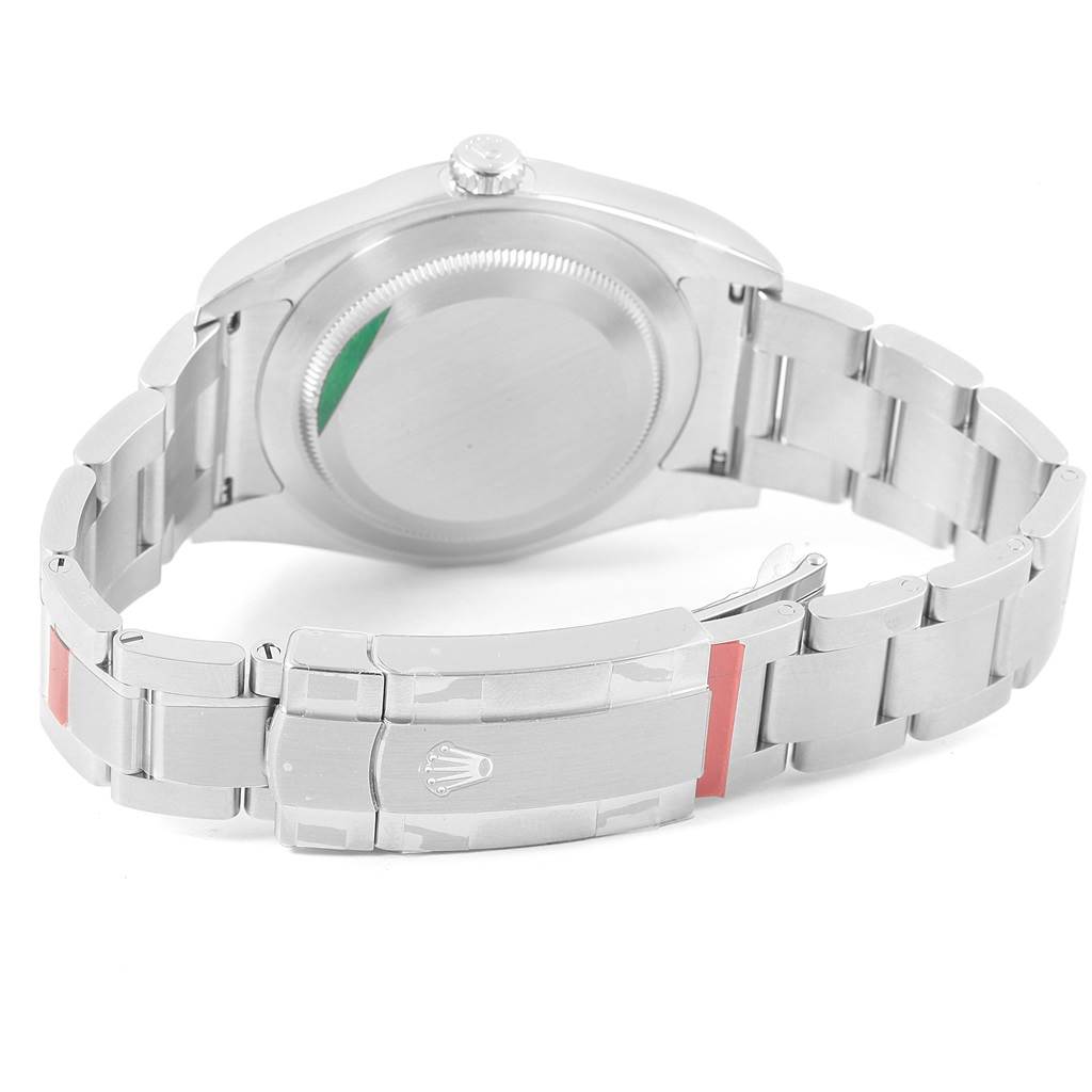 The image shows the back case and bracelet clasp of a Rolex Oyster Perpetual 114300 Stainless Steel Burgundy Dial 114300 Stainless Steel Burgundy Dial watch from a rear angle.