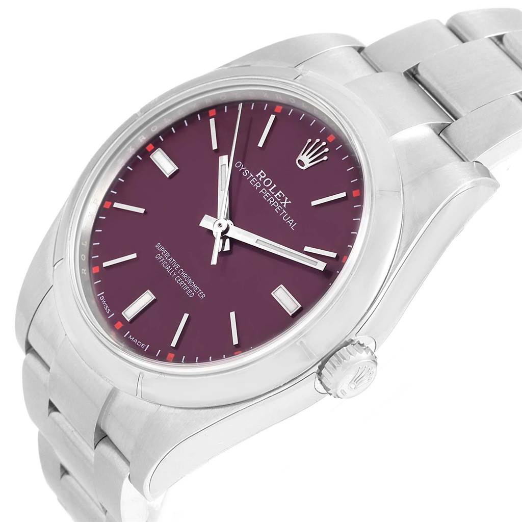 This Rolex Oyster Perpetual 114300 Stainless Steel Burgundy Dial 114300 Stainless Steel Burgundy Dial watch is shown at a three-quarter angle, displaying its dial, case, and a section of the bracelet.
