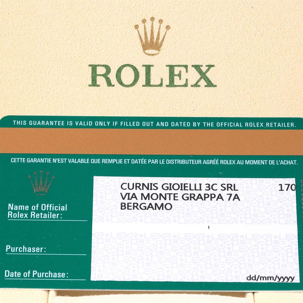 The image shows a Rolex guarantee card for the Oyster Perpetual model, featuring retailer and purchase information sections.