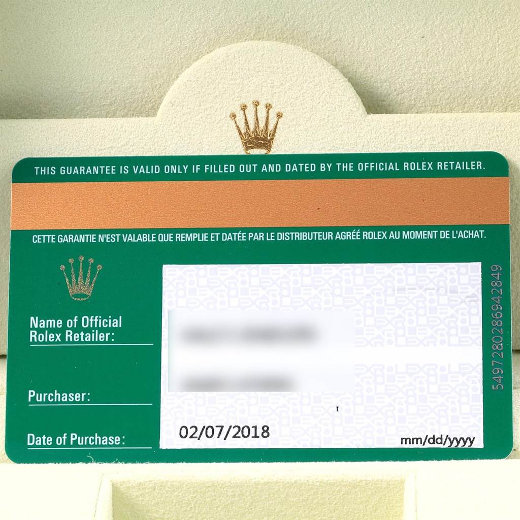 The image shows a warranty card for a Rolex Oyster Perpetual 114200 Men's Stainless Steel Champagne Dial 114200 Men's Stainless Steel Champagne Dial.