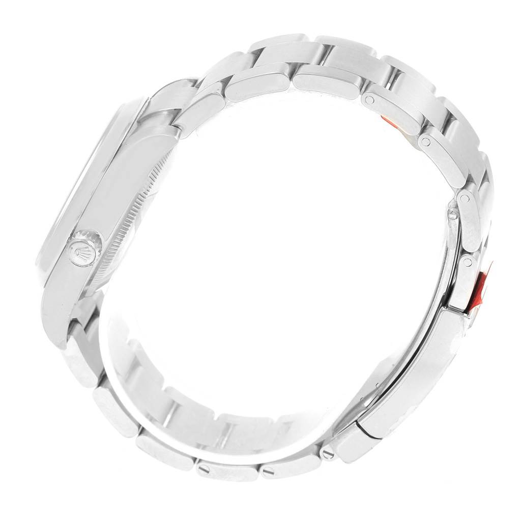 This image shows a side view of the Rolex Oyster Perpetual 114200 Men's Stainless Steel Blue Dial 114200 Men's Stainless Steel Blue Dial watch, highlighting its case and metal bracelet.