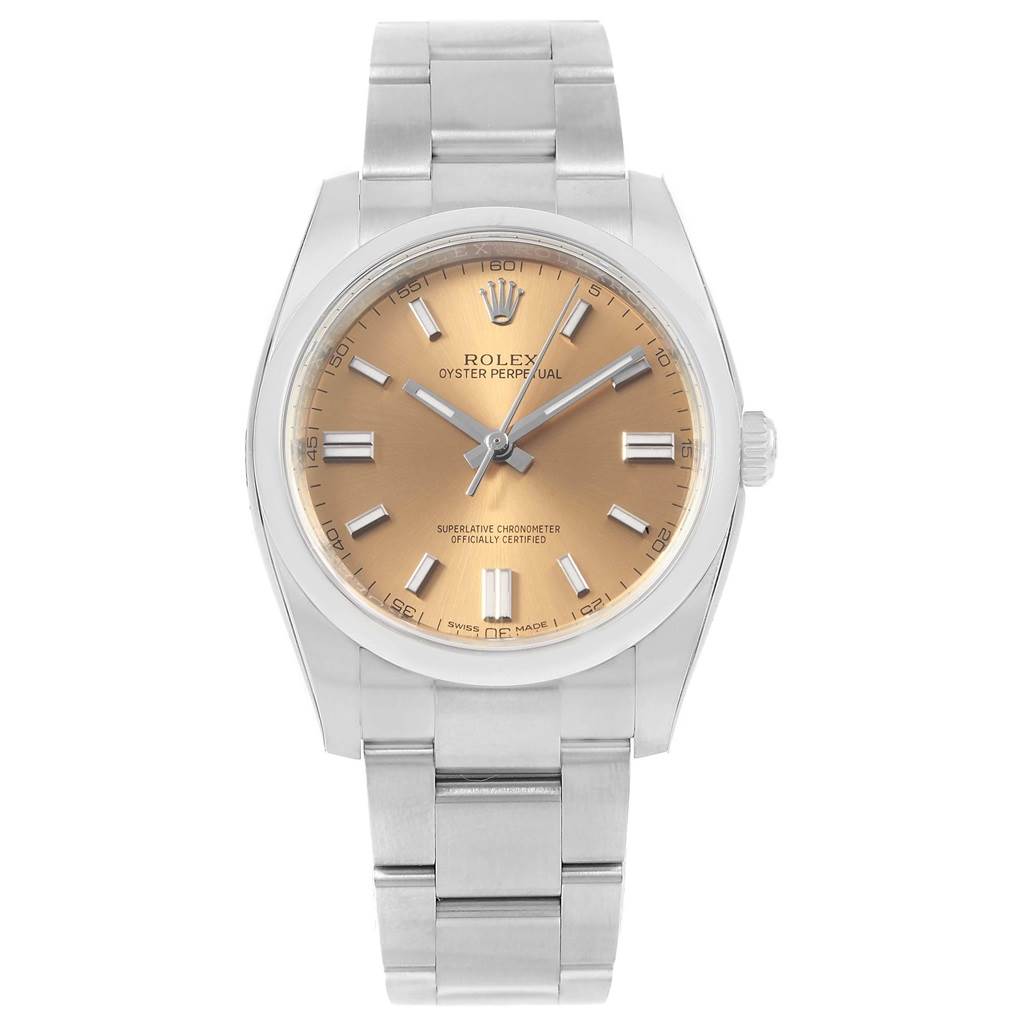 The Rolex Oyster Perpetual 116000 Men's Stainless Steel Champagne Dial 116000 Men's Stainless Steel Champagne Dial watch is shown from a top-down angle, highlighting its dial, bezel, and bracelet.