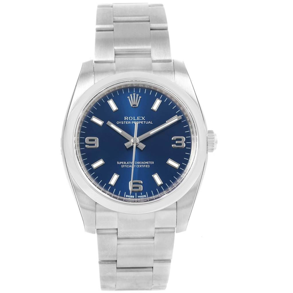 The image shows a front view of a Rolex Oyster Perpetual 114200 Men's Stainless Steel Blue Dial 114200 Men's Stainless Steel Blue Dial watch, focusing on the dial, case, and bracelet.