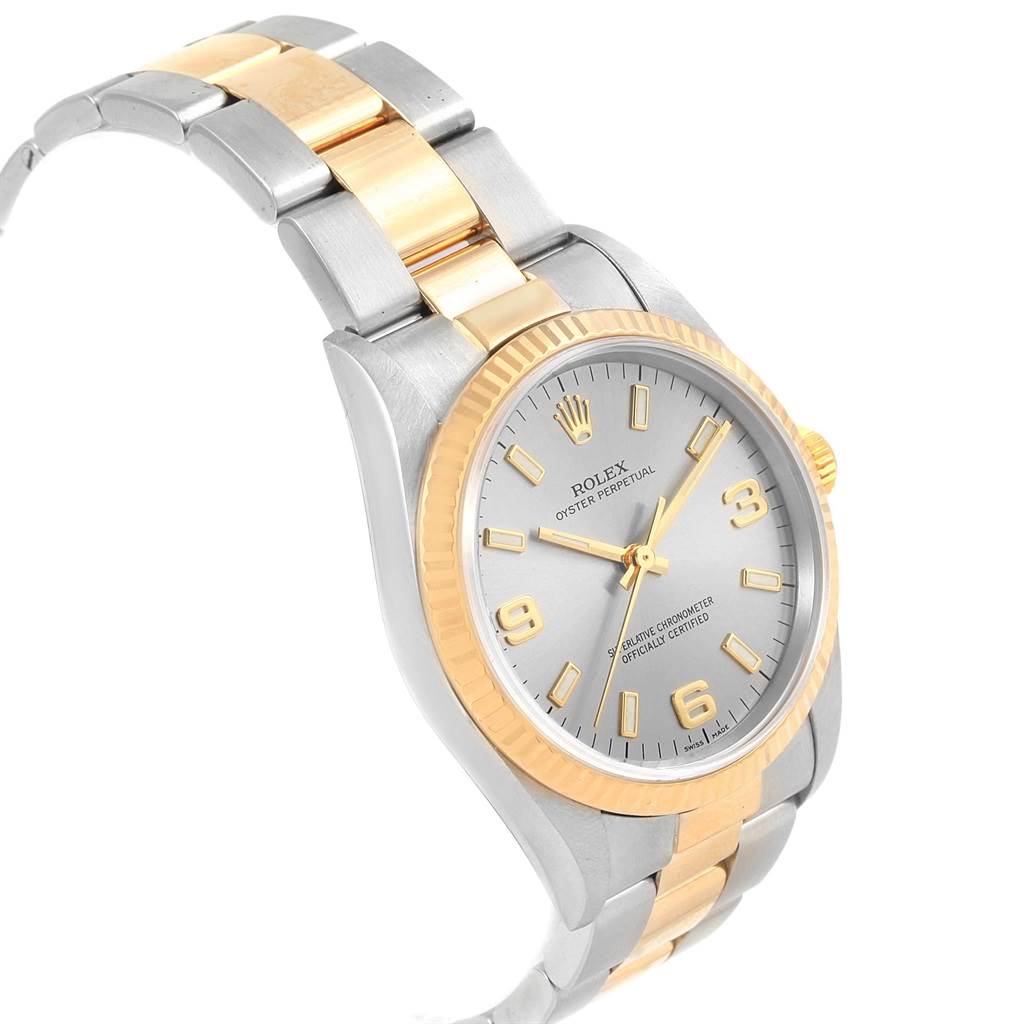 The image shows a full view of the Rolex Oyster Perpetual 14233 Men's Steel and Gold (two tone) Grey Dial 14233 Men's Steel and Gold (two tone) Grey Dial watch, highlighting the two-tone bracelet, bezel, dial, and crown.