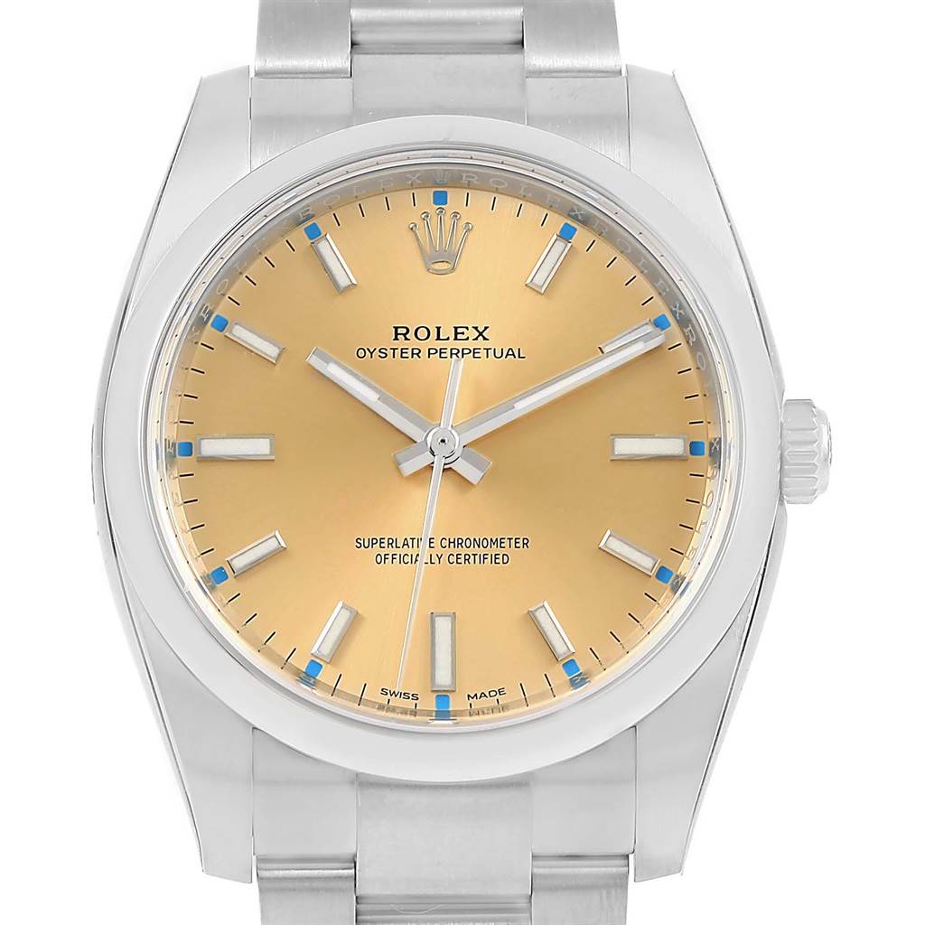 This image shows a front view of a Rolex Oyster Perpetual 60947155 Stainless Steel Champagne Dial 60947155 Stainless Steel Champagne Dial watch with a champagne dial and stainless steel case and bracelet.