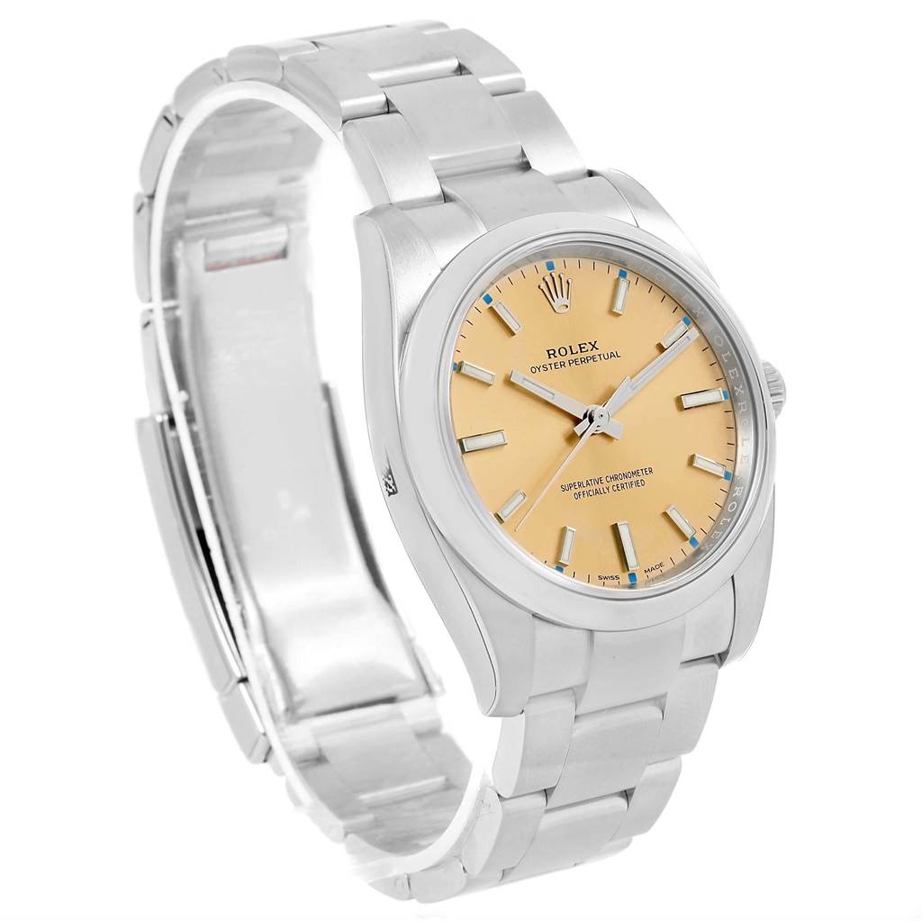 This image shows a side angle of a Rolex Oyster Perpetual 60947155 Stainless Steel Champagne Dial 60947155 Stainless Steel Champagne Dial watch, highlighting its face, dial, and bracelet.