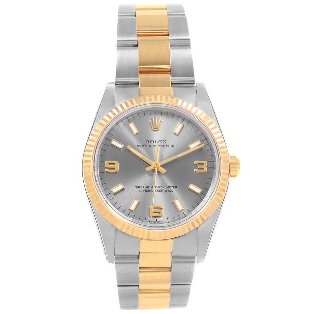 The Rolex Oyster Perpetual 14233 Men's Steel and Gold (two tone) Grey Dial 14233 Men's Steel and Gold (two tone) Grey Dial watch is shown from the front, displaying its face, bezel, and two-tone bracelet.
