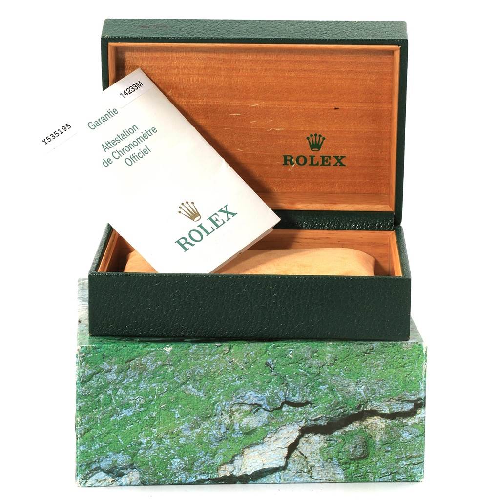 The image shows the packaging box and warranty card for a Rolex Oyster Perpetual 14233 Men's Steel and Gold (two tone) Grey Dial 14233 Men's Steel and Gold (two tone) Grey Dial watch.