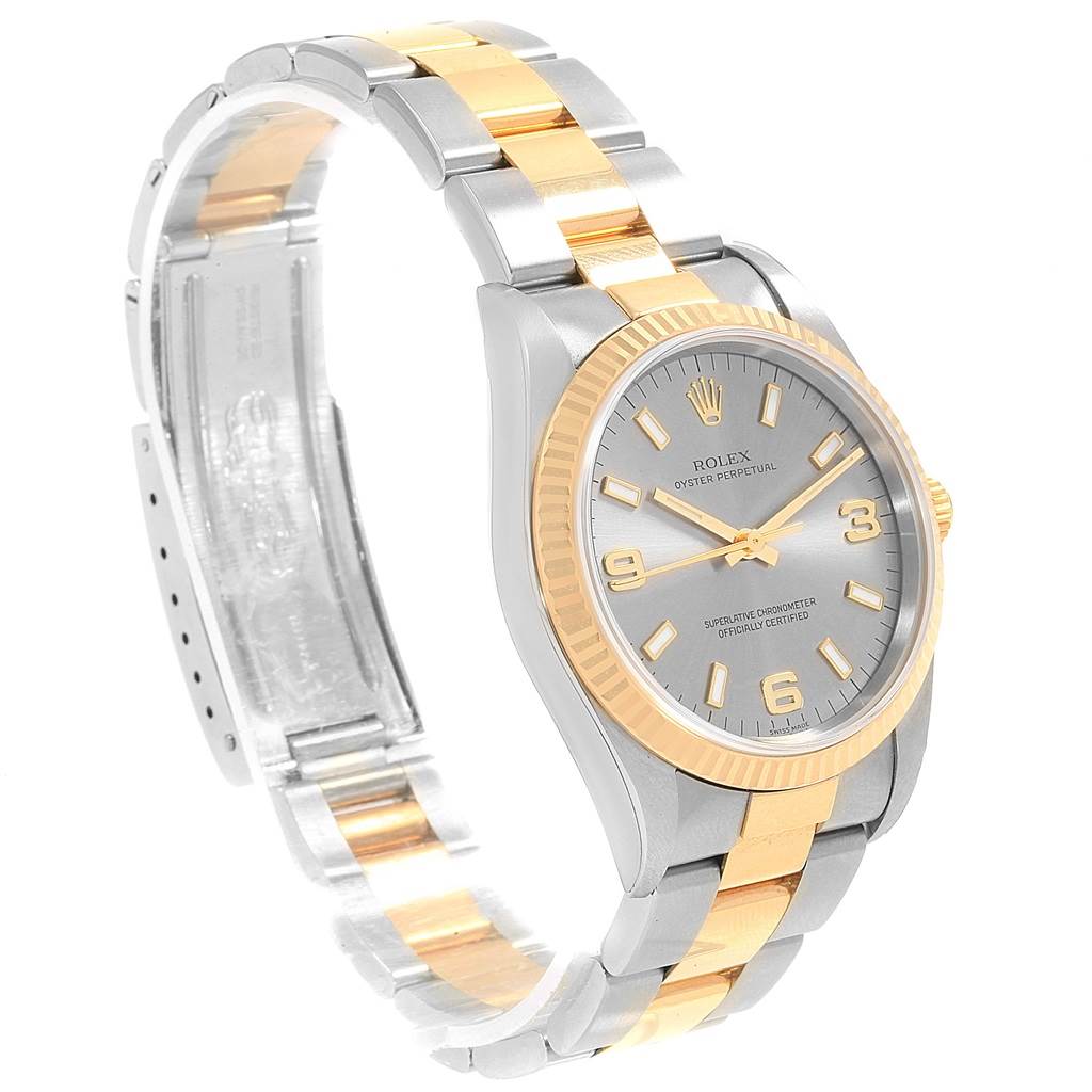 The image shows a Rolex Oyster Perpetual 14233 Men's Steel and Gold (two tone) Grey Dial 14233 Men's Steel and Gold (two tone) Grey Dial watch at a slight angle, highlighting its two-tone bracelet and grey dial.