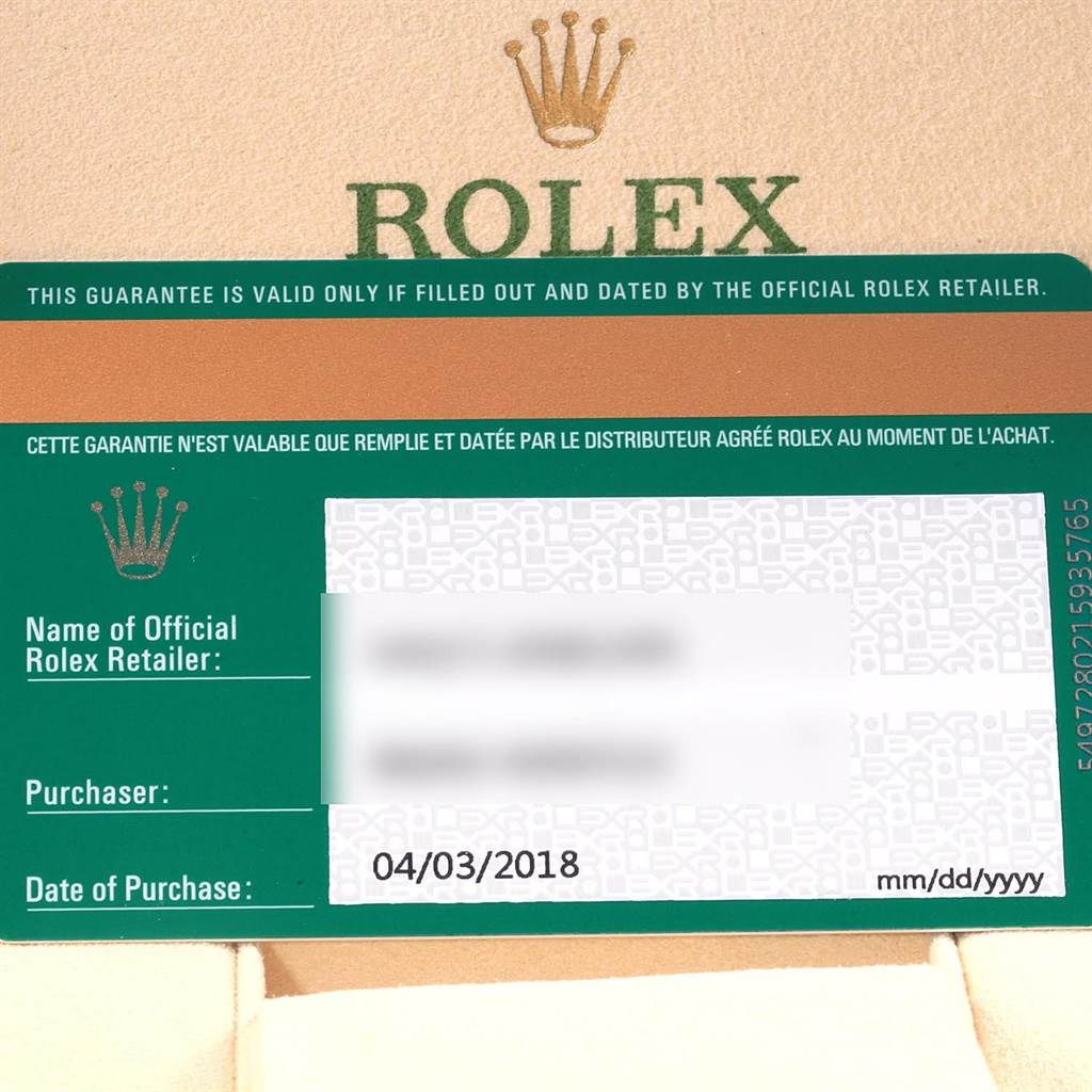 The image shows a guarantee card for a Rolex Oyster Perpetual 114200 Men's Stainless Steel Silver Dial 114200 Men's Stainless Steel Silver Dial watch, highlighting the date of purchase and space for retailer information.