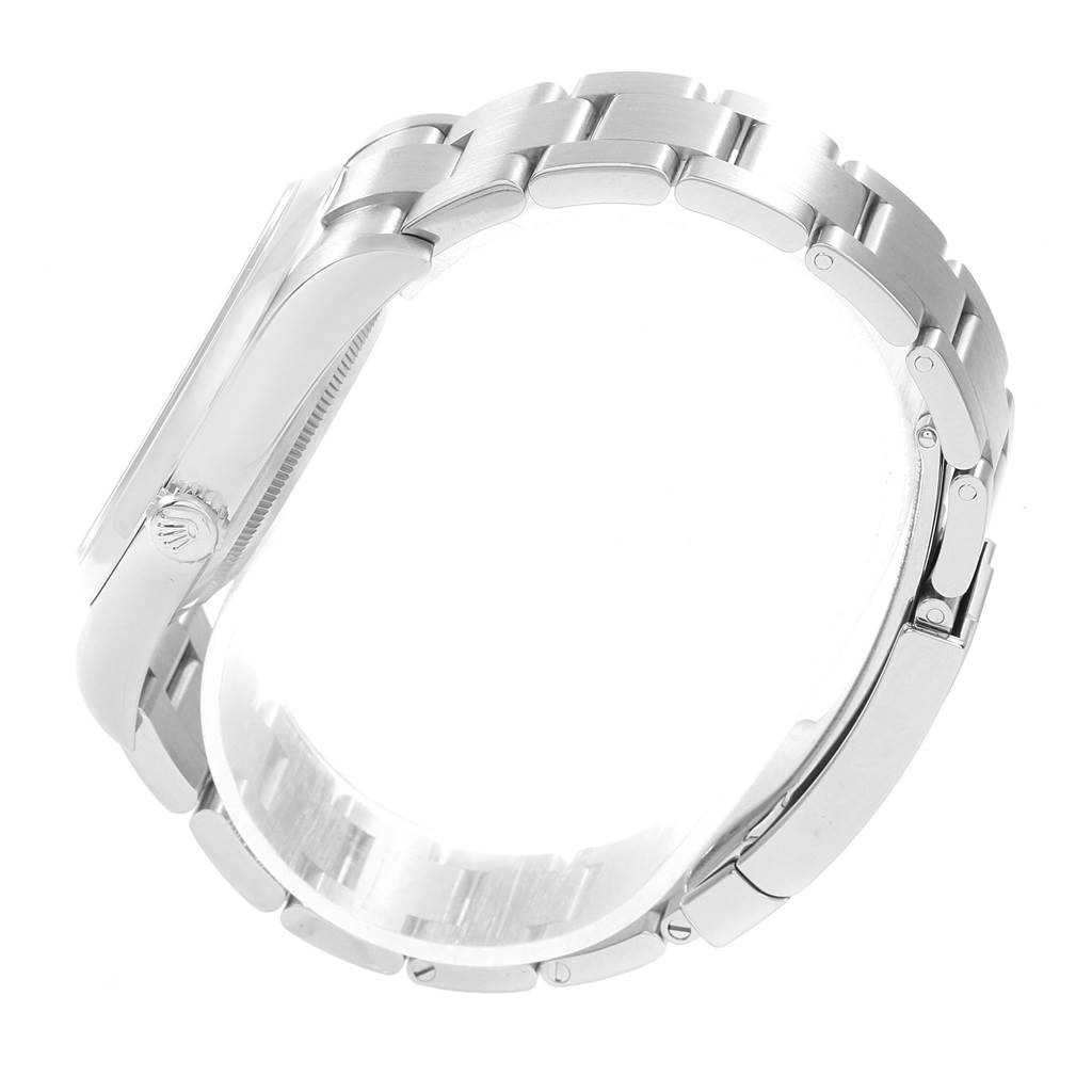 The image shows a side view of a Rolex Oyster Perpetual 114300 Men's Stainless Steel Grey Dial 114300 Men's Stainless Steel Grey Dial watch, highlighting its case and bracelet.