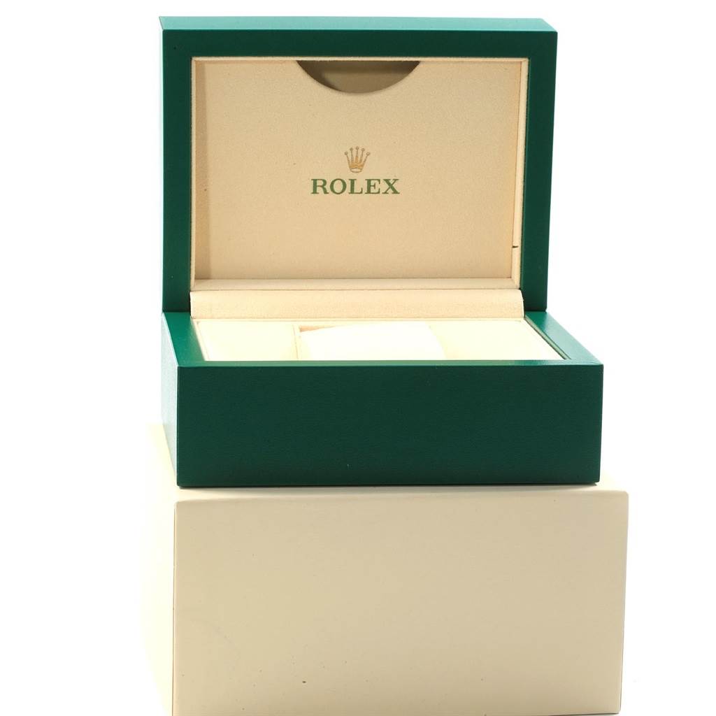 This image shows an open Rolex watch box for the Oyster Perpetual model.
