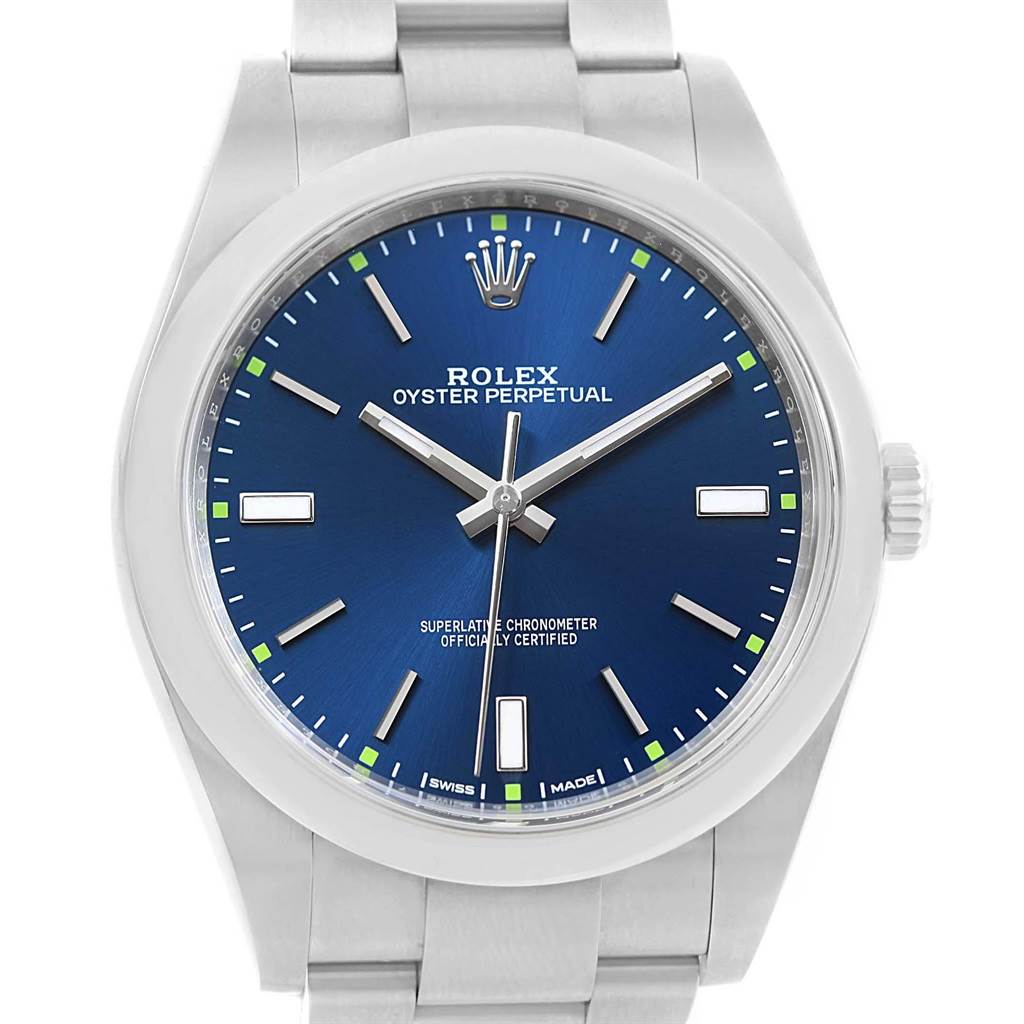 The image shows a front view of a Rolex Oyster Perpetual 114300 Men's Stainless Steel Blue Dial 114300 Men's Stainless Steel Blue Dial watch with a blue dial and silver bracelet.