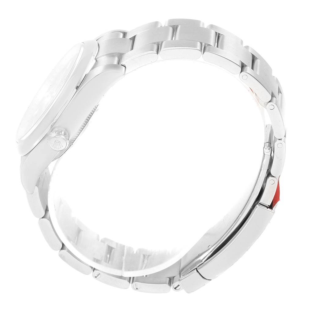 The image shows a side view of the Rolex Oyster Perpetual 114200 Men's Stainless Steel Blue Dial 114200 Men's Stainless Steel Blue Dial watch, highlighting the bracelet and clasp.