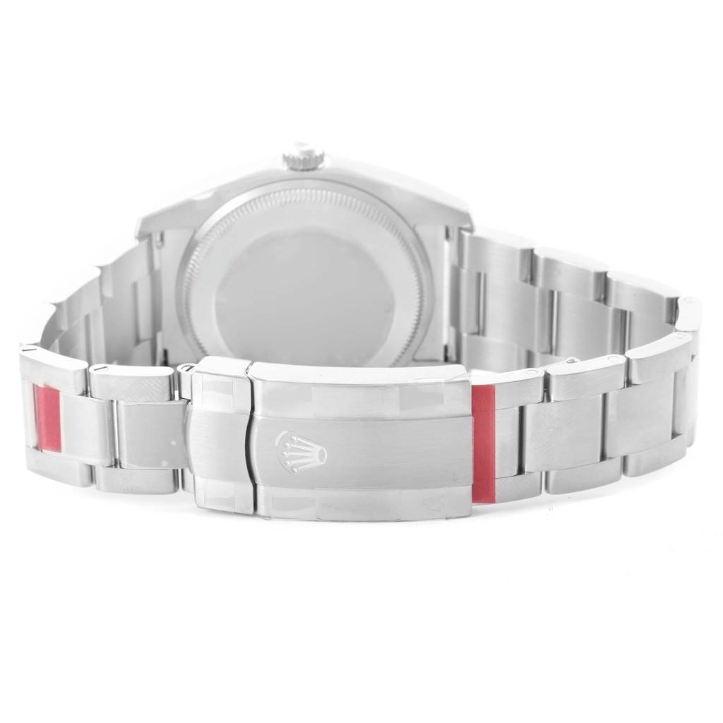 The image shows the back and clasp of a Rolex Oyster Perpetual 114200 Men's Stainless Steel Silver Dial 114200 Men's Stainless Steel Silver Dial watch.