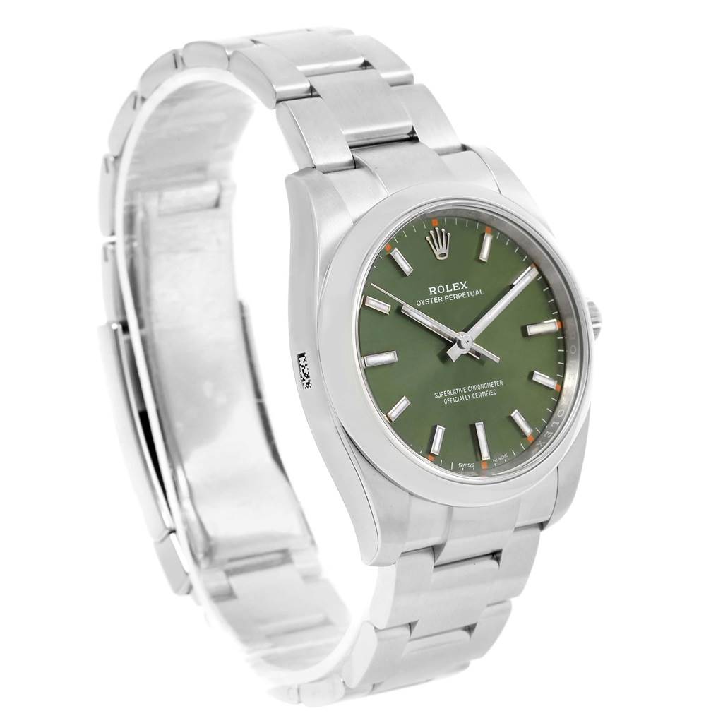 The Rolex Oyster Perpetual 114200 Men's Stainless Steel Green Dial 114200 Men's Stainless Steel Green Dial watch is shown at an angled view displaying the green dial, case, and partially opened metal bracelet.