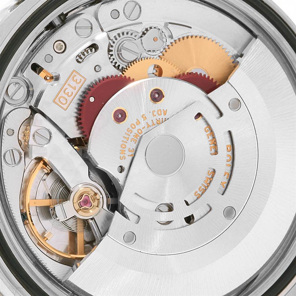 The image shows a close-up view of the internal movement mechanism of a Rolex Oyster Perpetual 116034 Men's Stainless Steel Silver Dial 116034 Men's Stainless Steel Silver Dial watch.